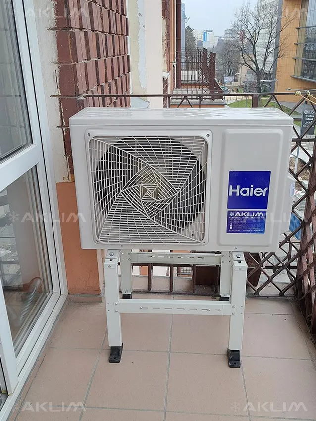 Montaż klimatyzacji do ogrzewania domu Haier Flexis jednostka zewnętrzna